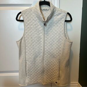 Orvis beige lady’s zip up vest with pockets and high neck